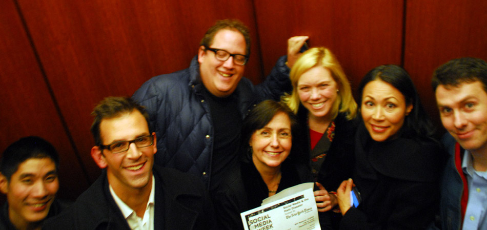 DB1_7121-group-in-elevator-shot
